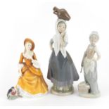 Collectable china including Royal Copenhagen robin, Nao figurine of a water carrier and Royal