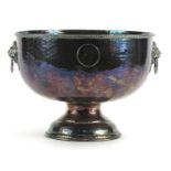 Silver plated copper pedestal fruit bowl set with George III pennies, having lion mask ring