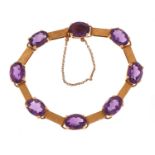 Unmarked gold amethyst bracelet, tests as 18ct gold, 20cm in length, 21.0g