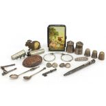 Silver and other objects including propelling pencil, thimbles, railway badge and novelty tape