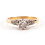 18ct gold diamond solitaire ring with diamond set shoulders, the central diamond approximately 4.9mm