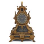 Philippe Rouen, 19th century Rococo style gilt metal and black slate mantle clock, with circular