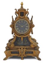 Philippe Rouen, 19th century Rococo style gilt metal and black slate mantle clock, with circular