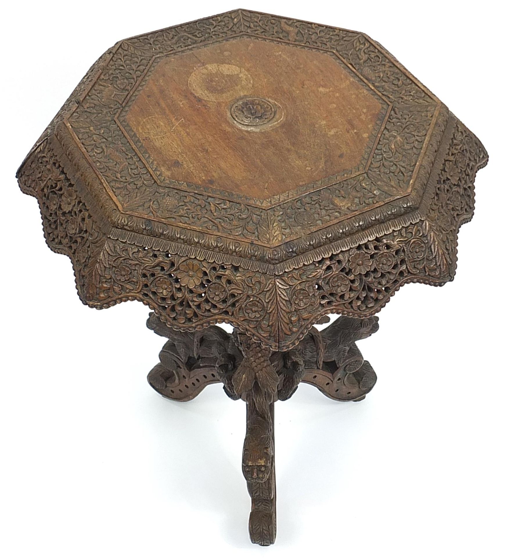 Burmese side table with octagonal top profusely carved with wild animals amongst flowers, with - Image 2 of 4