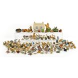 Large collection of Wade Whimseys, figures and Post Office butter dish, the largest 15cm wide