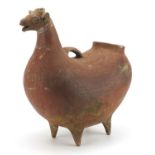 Peruvian terracotta vessel in the form of a llama with remnants of white paint, 40cm in length