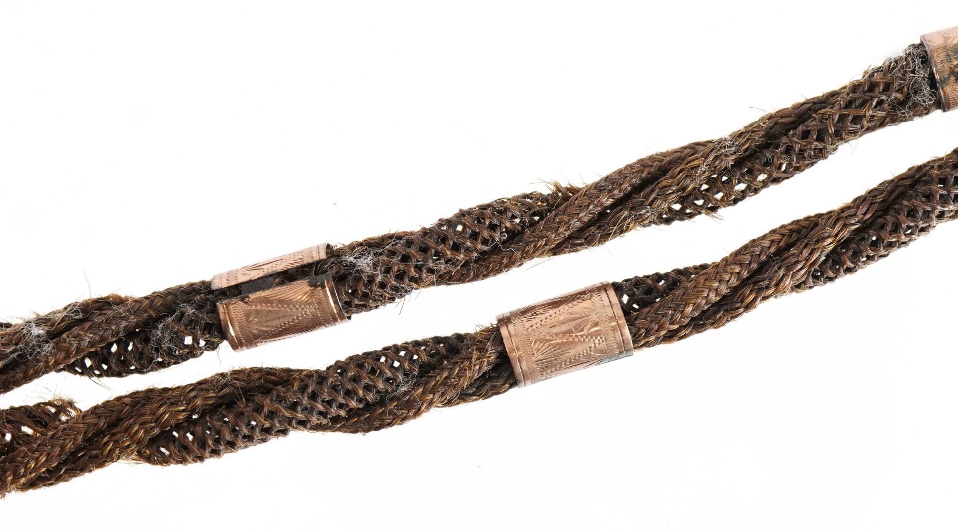 Victorian plaited hair watch chain with gilt metal mounts, 30cn in length