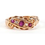 18ct gold ruby and diamond crossover ring, Birmingham 1917, size L, 1.9g