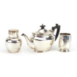Silver items comprising teapot, caddy and christening tankard, the teapot 23.5cm in length, total