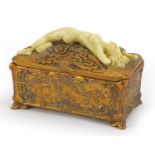 Art Nouveau style box and cover, the lid with a nude figurine, 20cm wide