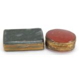 Two brass pill boxes including one with moss agate, the largest 6cm wide