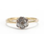 18ct gold and platinum diamond flower head ring, size K, 1.6g