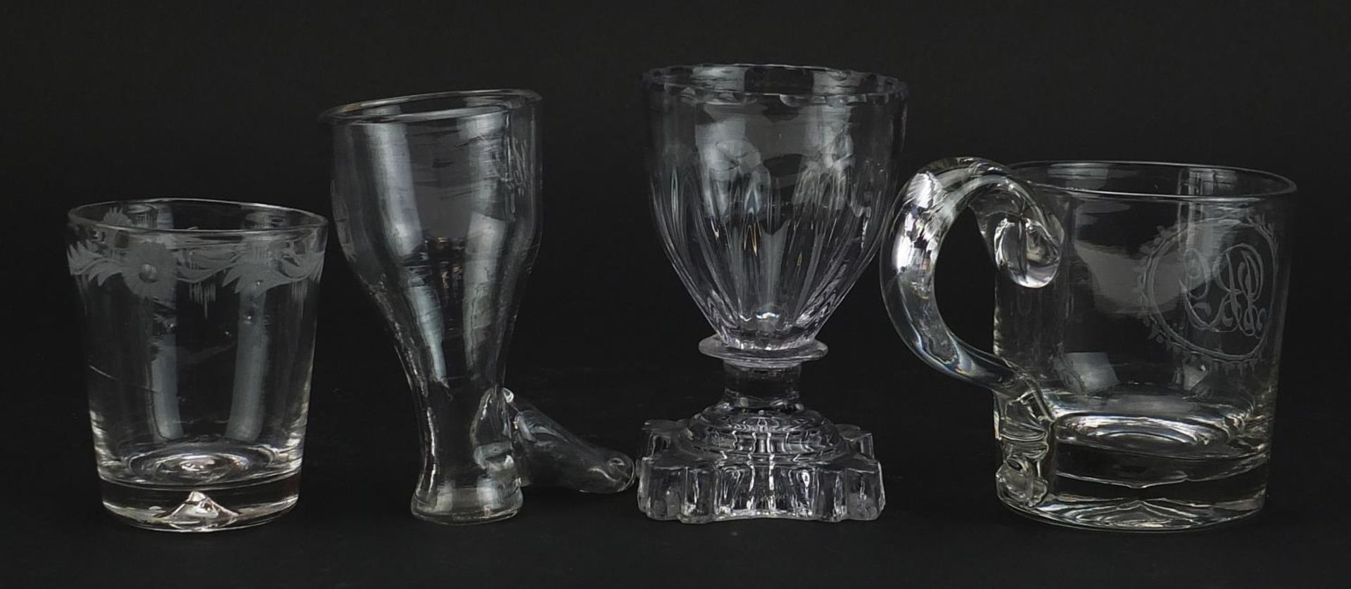 Four 18th century glasses including a stirrup cup and handled cup with engraved initials, the - Image 2 of 3