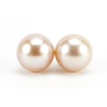 Pair of 9ct gold pink freshwater pearl stud earrings approximately 8mm in diameter, 2.4g