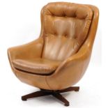 Vintage tan faux leather swivel tub chair with button back upholstery, 98cm high