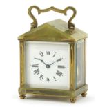Green onyx and brass carriage clock, the enamelled dial having Roman numerals, 14cm high