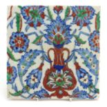 Turkish Iznik pottery tile hand painted with flowers, 24.5cm x 24.5cm