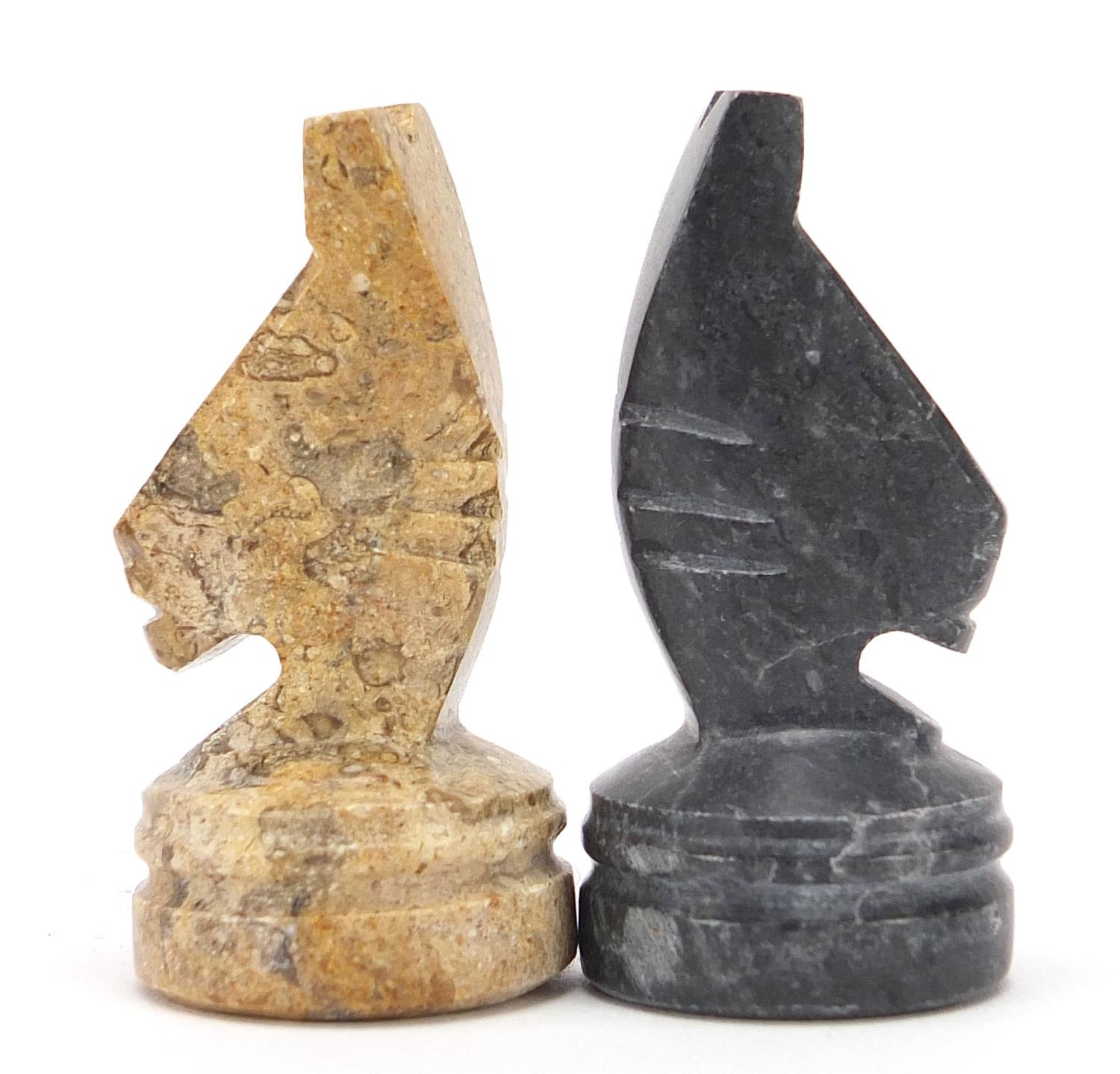 Carved stone chess set with inlaid marble board, the largest pieces each 6.5cm high, the board - Image 6 of 7