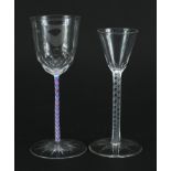 Two antique wine glasses with opaque twist stems, the largest 16cm high