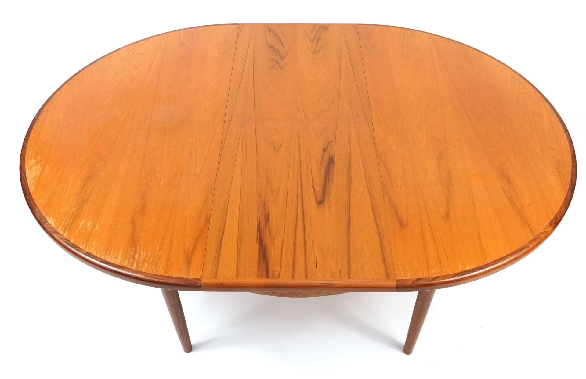 Mid century G Plan teak extending dining table and six chairs, the table 72cm high x 122cm in - Image 3 of 6