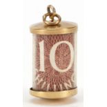 9ct gold emergency ten shilling note charm, 2.7cm high, 2.5g