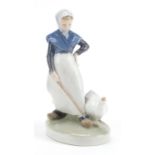 Royal Copenhagen, Danish figurine of a farmer girl with a goose, 18cm high