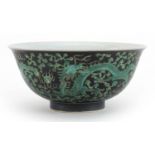 Chinese porcelain black ground bowl hand painted with dragons chasing pearl amongst clouds, 16cm