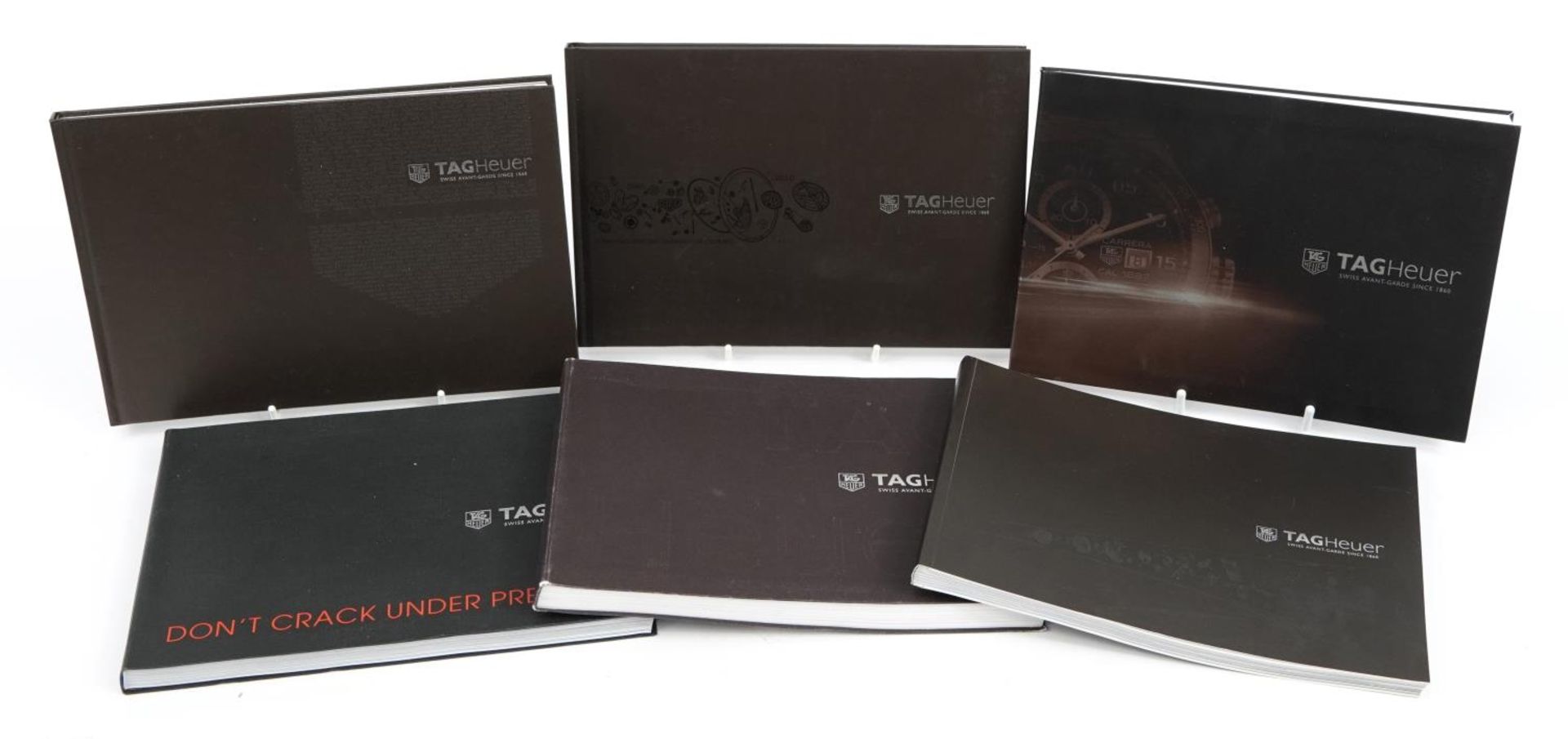 Six Tag Heuer watch catalogues, various years