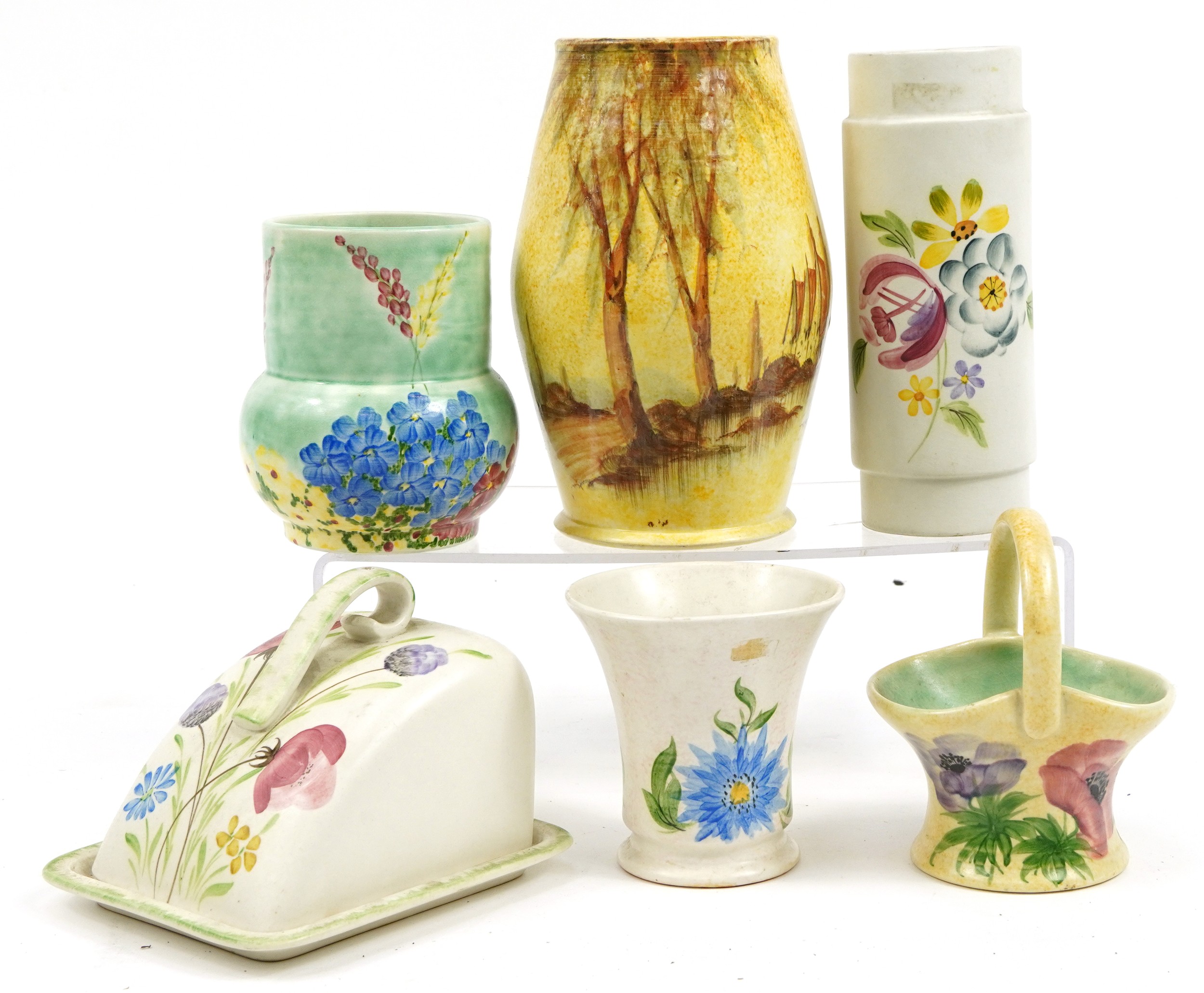 Five Bradford Pottery vases and butter dish with cover, each hand painted with flowers and trees,