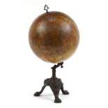 A N Lebegue & Co, 19th century French terrestrial table globe on cast iron tripod base with paw feet