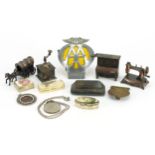Objects including AA car radiator badge, military interest belt buckle and novelty pencil sharpeners