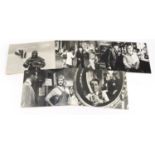 Five large black and white film stills, mounted on card including The Servant, I'm Alright Jack,