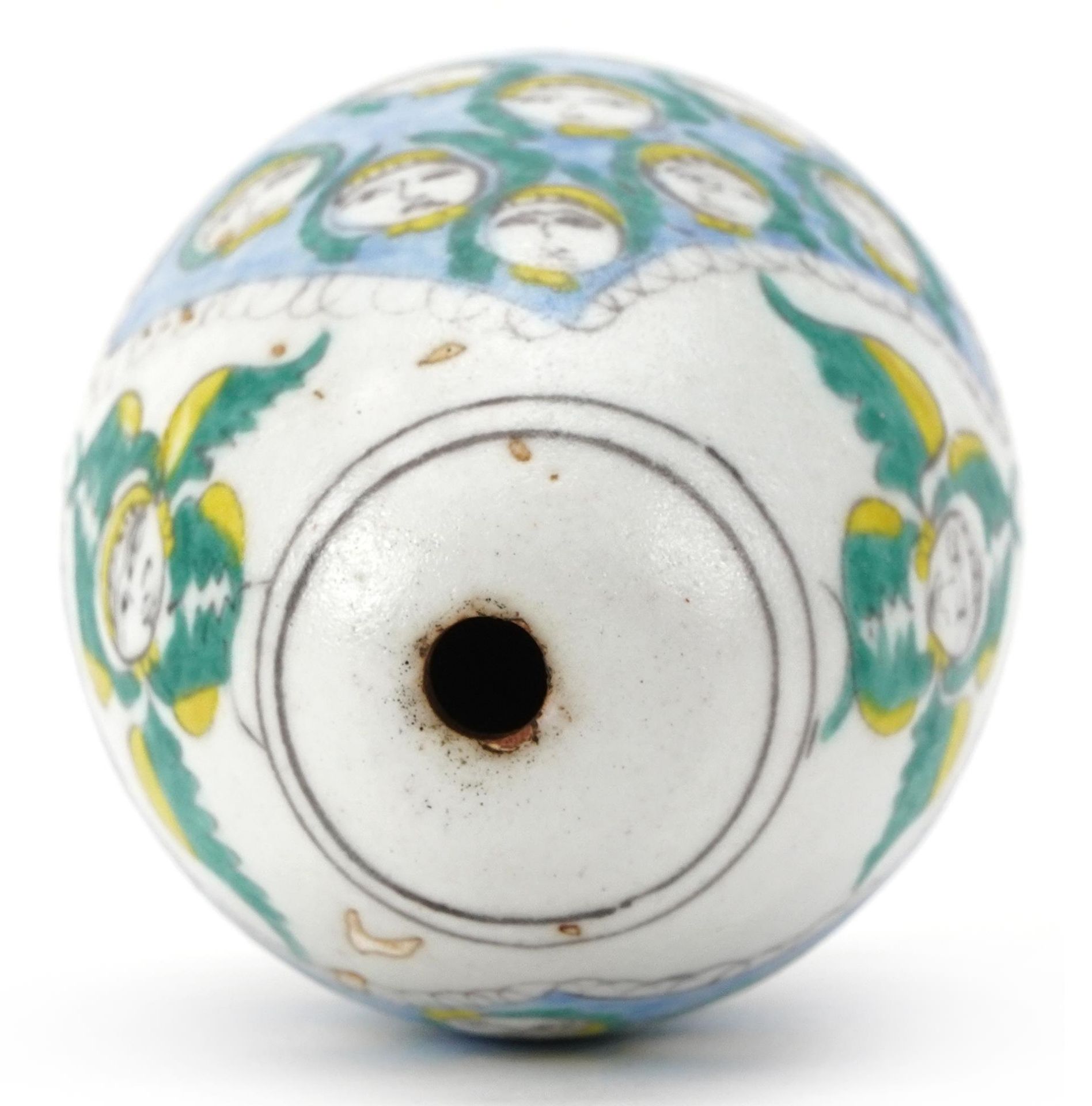 Turkish Armenian pottery hanging ball hand painted with mythical faces, 10cm high - Image 3 of 3