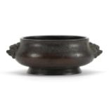 Chinese bronze incense burner with animalia twin handles, four figure character marks to the base,