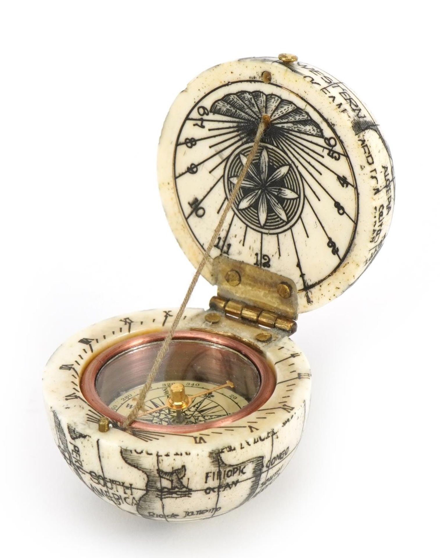 Sailor's style carved bone pocket globe compass, 4cm in diameter