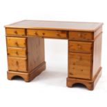 Pine twin pedestal desk with tooled leather insert, 76cm H x 121cm W x 63cm D