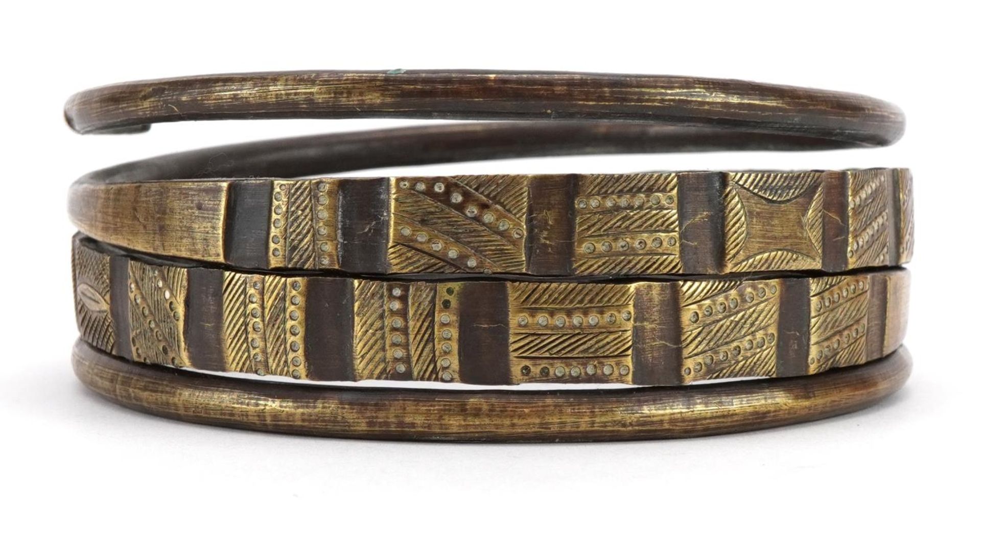 African tribal interest bronze coiled arm bracelet, possibly Ethiopian, 11cm in diameter