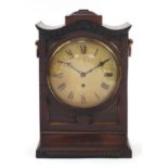 Early 19th century mahogany bracket clock with circular dial painted dial having Roman numerals,