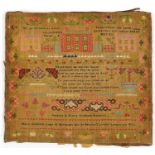 Mid 19th century needlework sampler with religious verses, flowers and buildings, worked by Mary