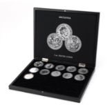 Eleven Elizabeth II Britannia one ounce fine silver two pound coins arranged in a Britannia silver
