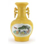 Chinese porcelain yellow ground vase with ring turned handles hand painted with children playing,
