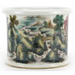 Chinese porcelain brush pot hand painted in the famille rose palette with continuous river landscape