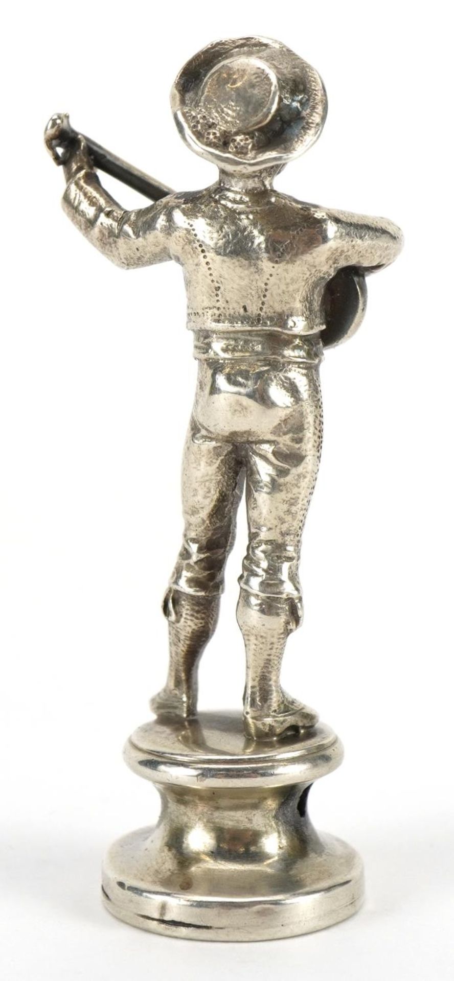 Unmarked silver pipe tamper with seal in the form of a Mexican musician, 5.5cm high, 21.3g - Image 2 of 3