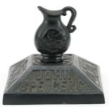 Early 20th century cast iron paperweight advertising John Spencer Co of London Piano Makers, 6.5cm