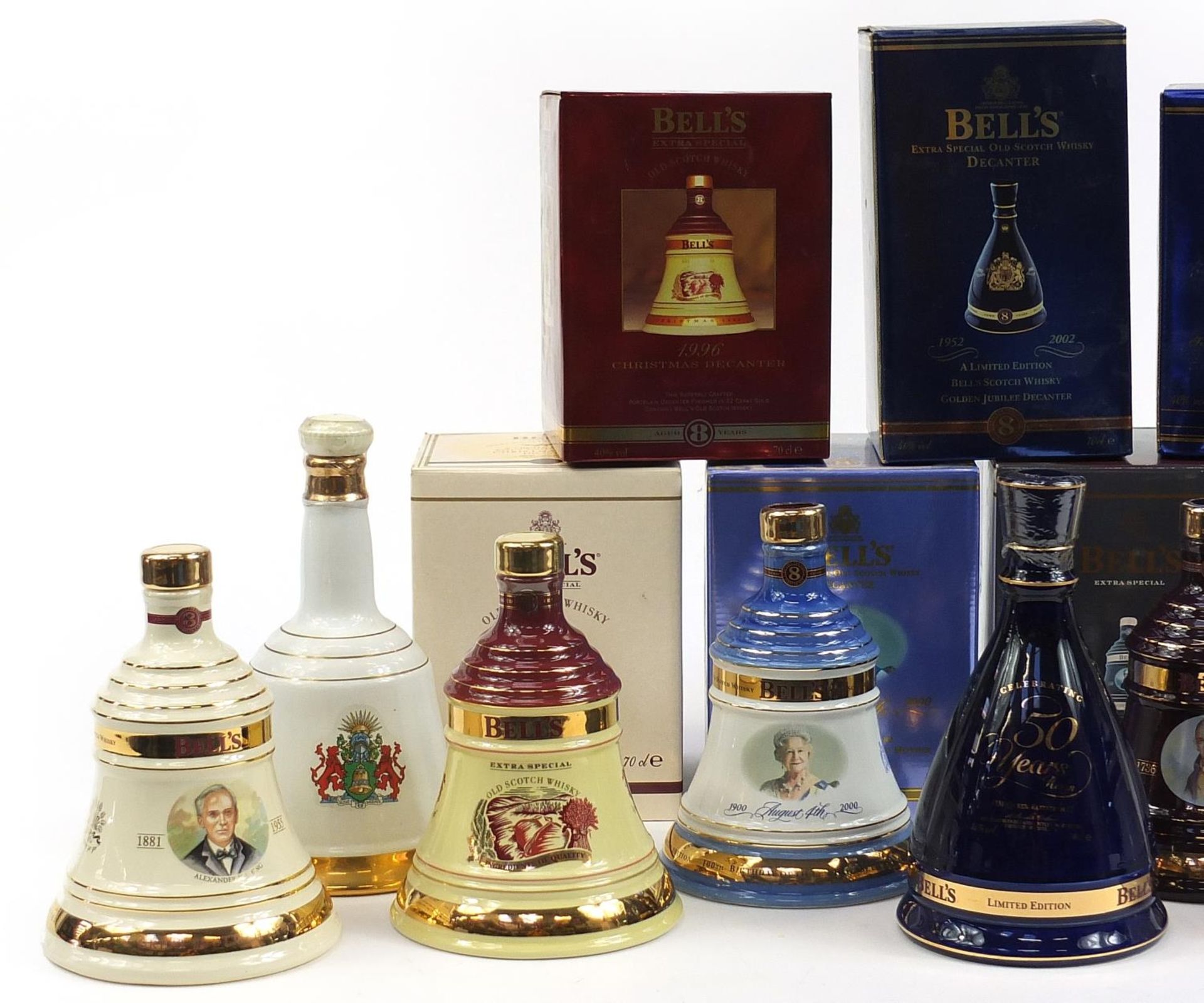Eight Bells 8 Year whisky commemorative sealed decanters with contents, seven with boxes, - Image 2 of 3