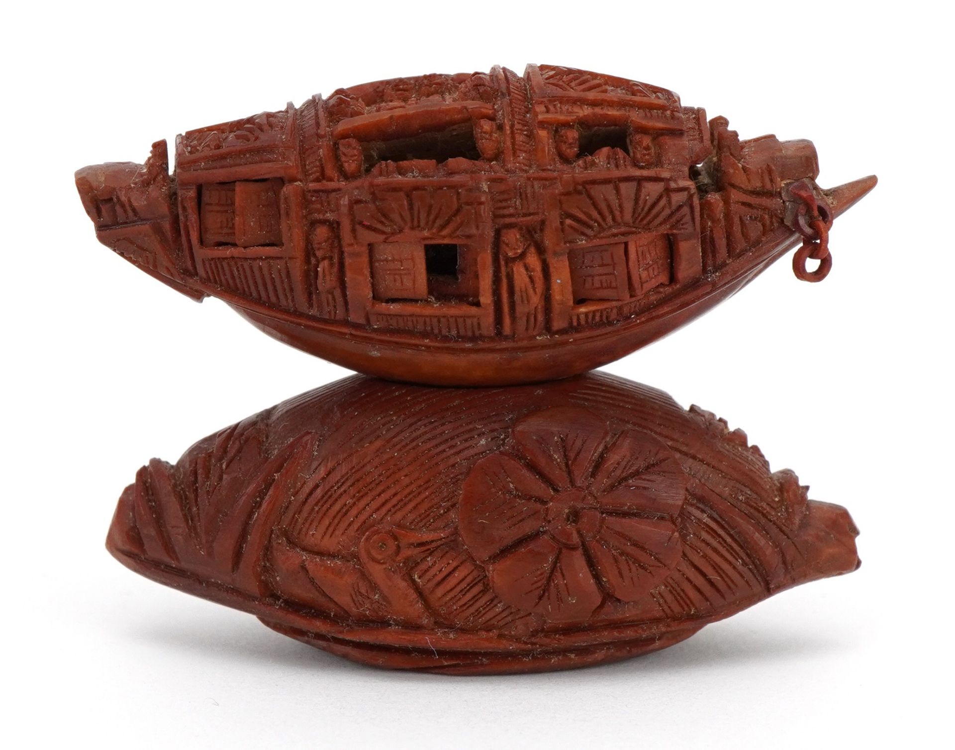 Good Chinese carved coquilla nut junk with opening windows and inscribed poem, raised on a - Image 2 of 9
