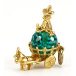 9ct gold horse and cart charm set with a green stone, 2.3cm high, 4.5g