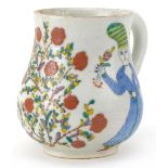 Turkish Kutahya pottery handled baluster cup hand painted with figures in traditional dress