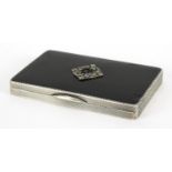 Rectangular silver black enamel and marcasite cigarette case with engine turned decoration, H C F