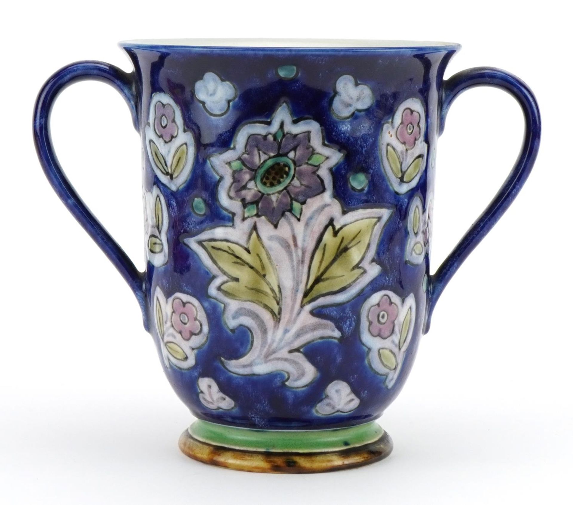 Doulton stoneware loving cup with twin handles hand painted with stylised flowers, 18.5cm high - Image 2 of 4